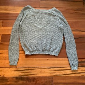 Womens size medium grey sweater with cutout.